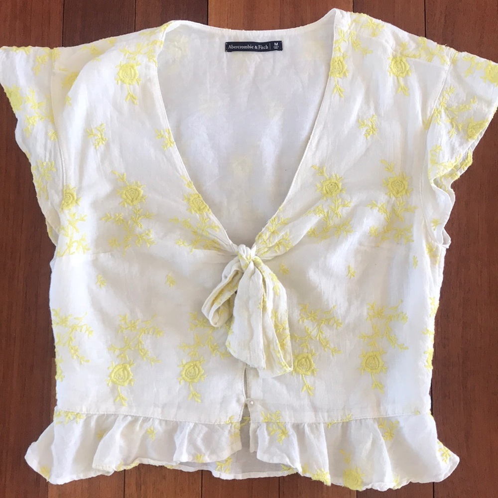 White and yellow blouse